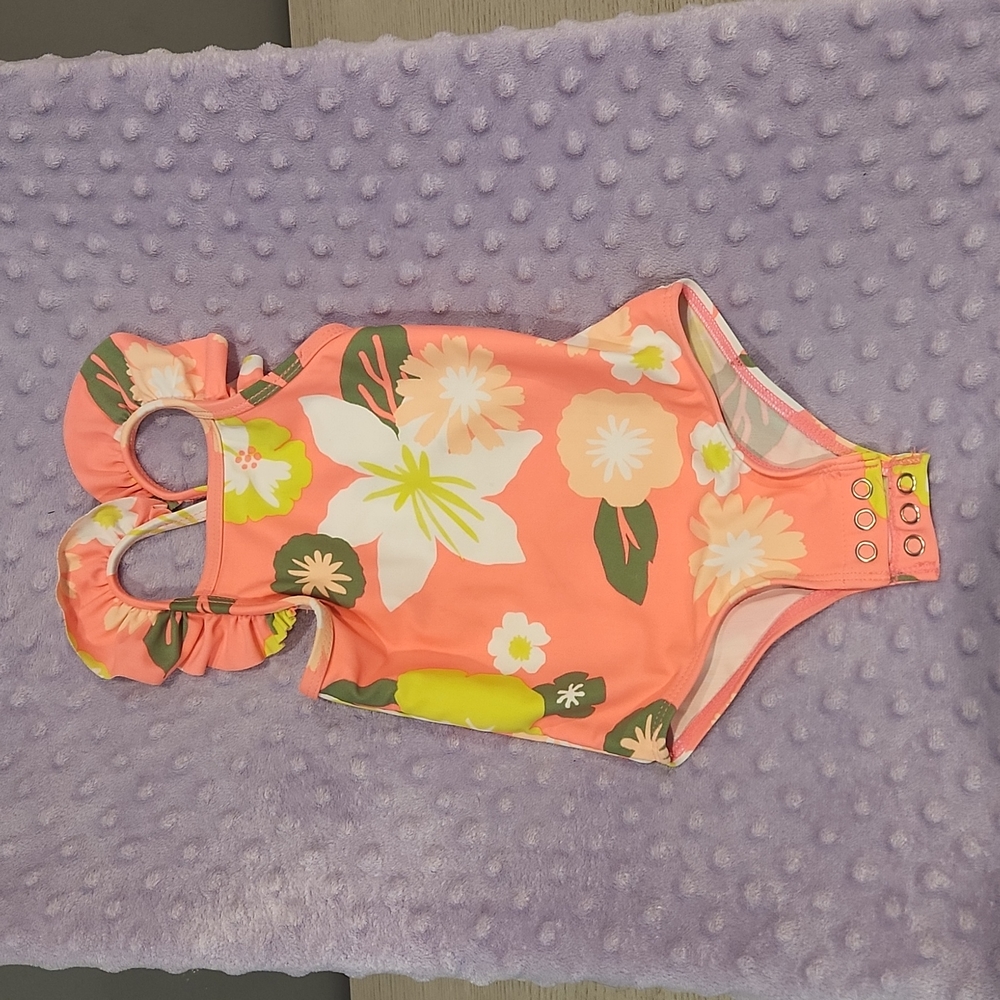 Carter's 12m swimsuit. Excellent condition.